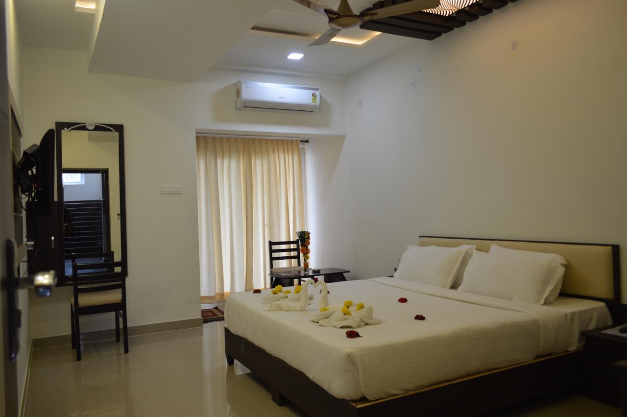 Hotel Ambai Grand Ambāsamudram Exterior foto